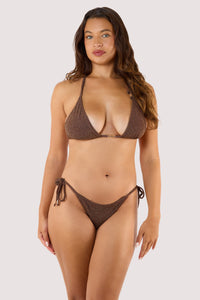Model wearing metallic bronze bikini with glitter finish, triangle bra and string briefs.