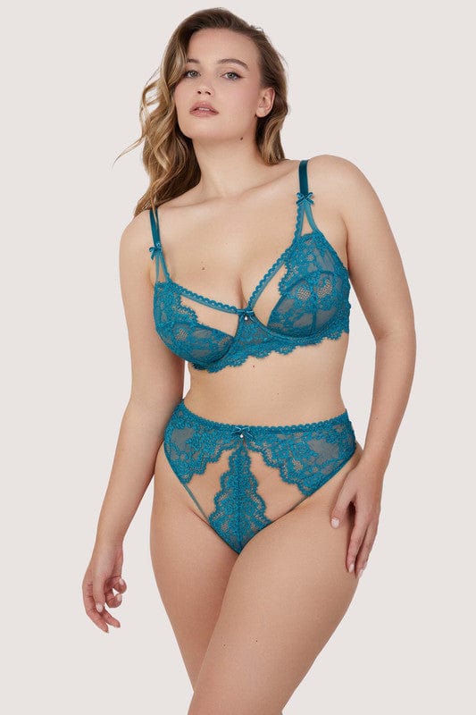 Model wears a teal eyelash lace balconette bra with underwired balconette cups, velvet bow with pearl charm and nude mesh with teal eyelash lace, with a matching high waist thong.