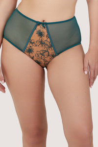 Model wears Teal High-Waist Thong featuring sheer teal mesh and minimal coverage, showcasing a bold and feminine lingerie style