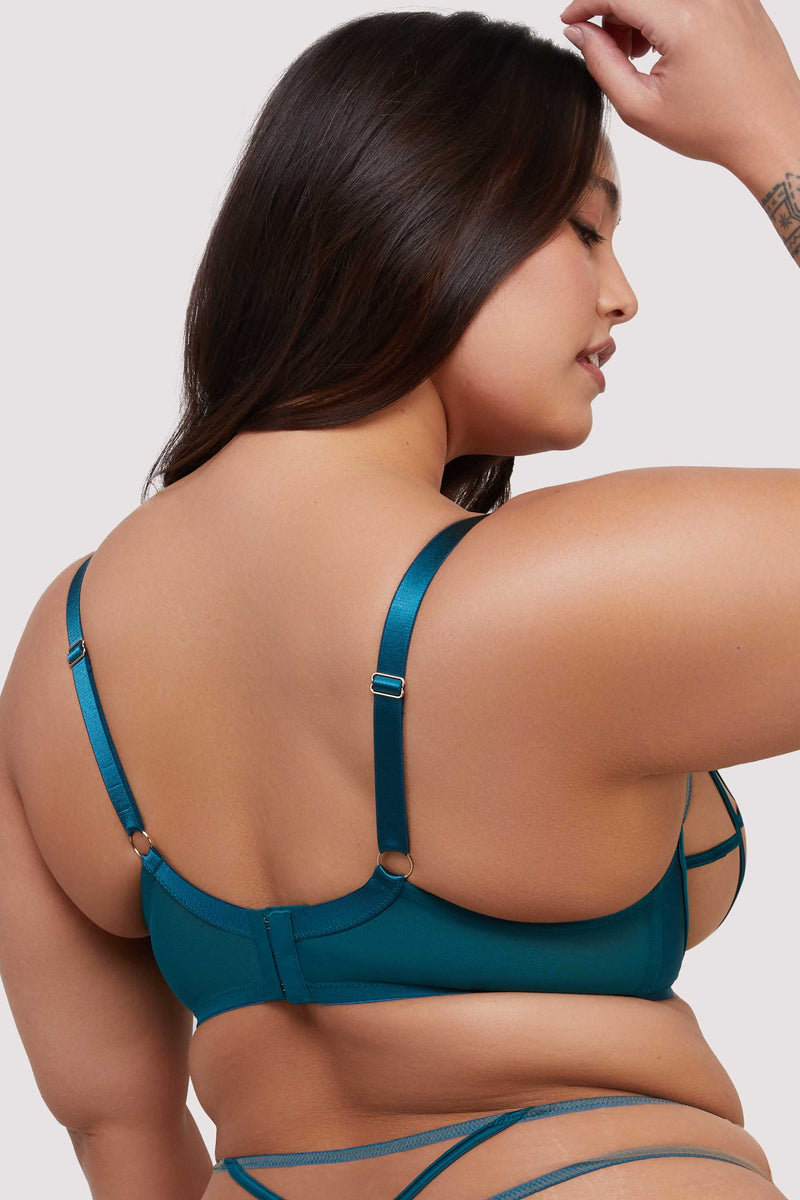model shows teal mesh hook and eye fastening bra back