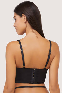 Model shows back of black mesh basque with hook and eye closure and adjustable straps